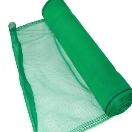 Open roll of green scaffold netting